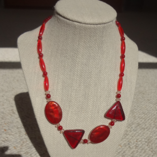 red-triangle-oval-neckles